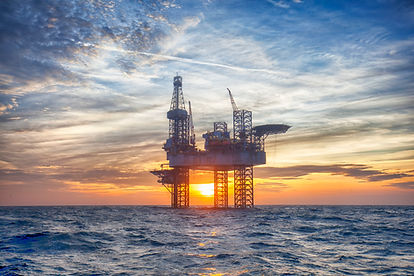 an-offshore-drilling-rig-at-sunset.jpg