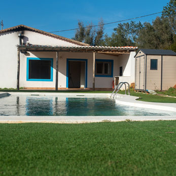Back patio facing pool and yard.
