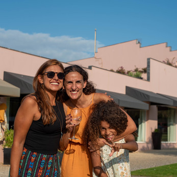 Author posing with friends at the event.