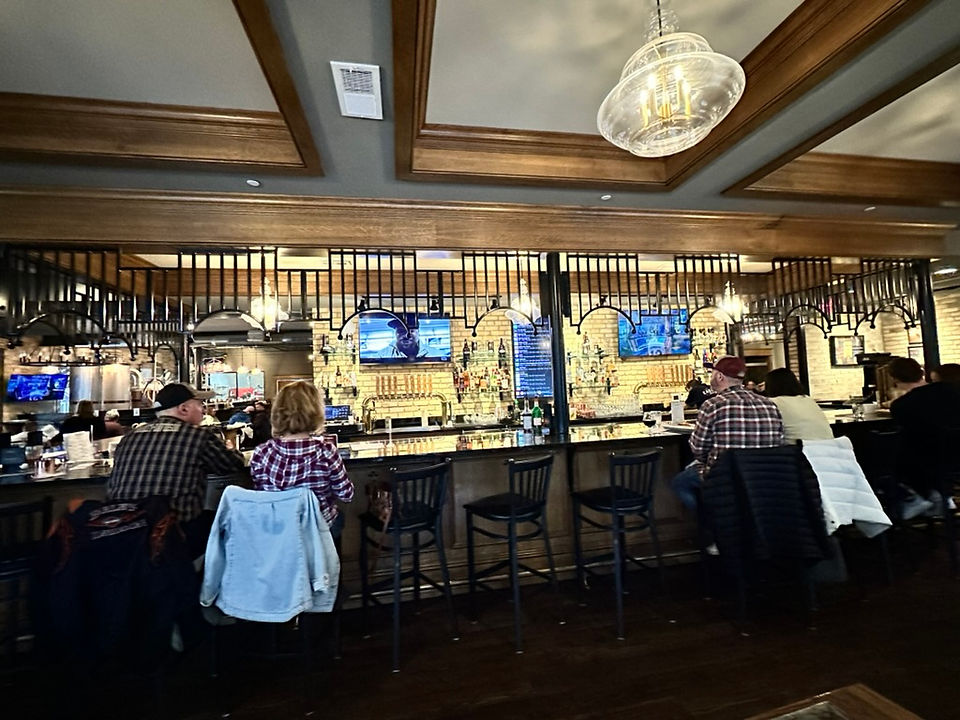 Crusin' For Booze- Wisconsin Beer Wine Distillery Bloggers- East Troy Brewery-  Bar with Bank Teller Security