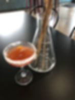 Crusin' For Booze- Wisconsin Travel Alcohol Blogger- Dog and Shrub Distillery- Cocktail with table decorations