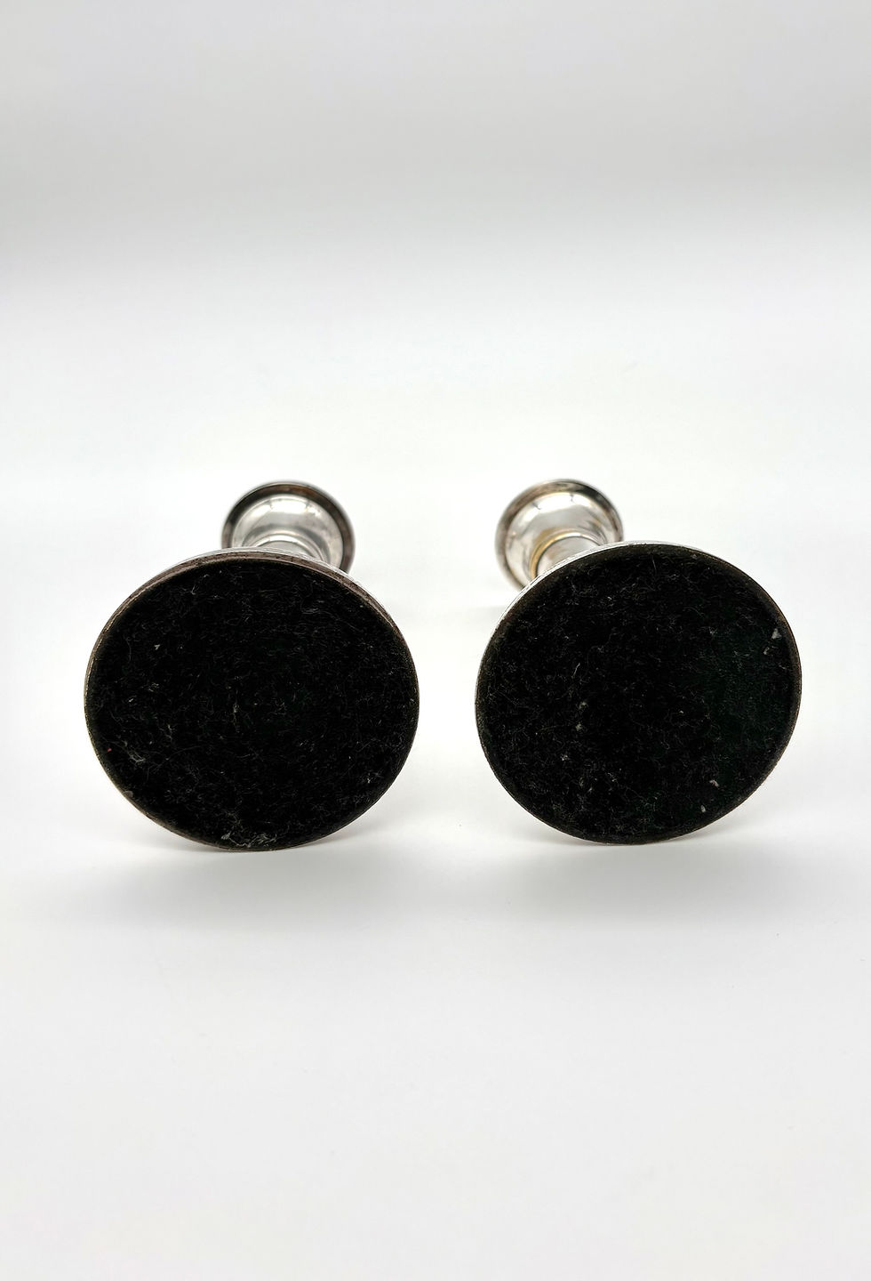 Thumbnail: A pair of silver plated trumpet candlesticks, base view
