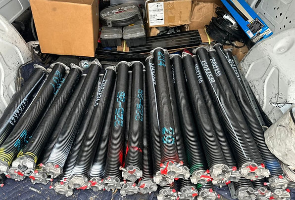 Stock of durable garage door springs ready for installation by BlackBear in Los Angeles