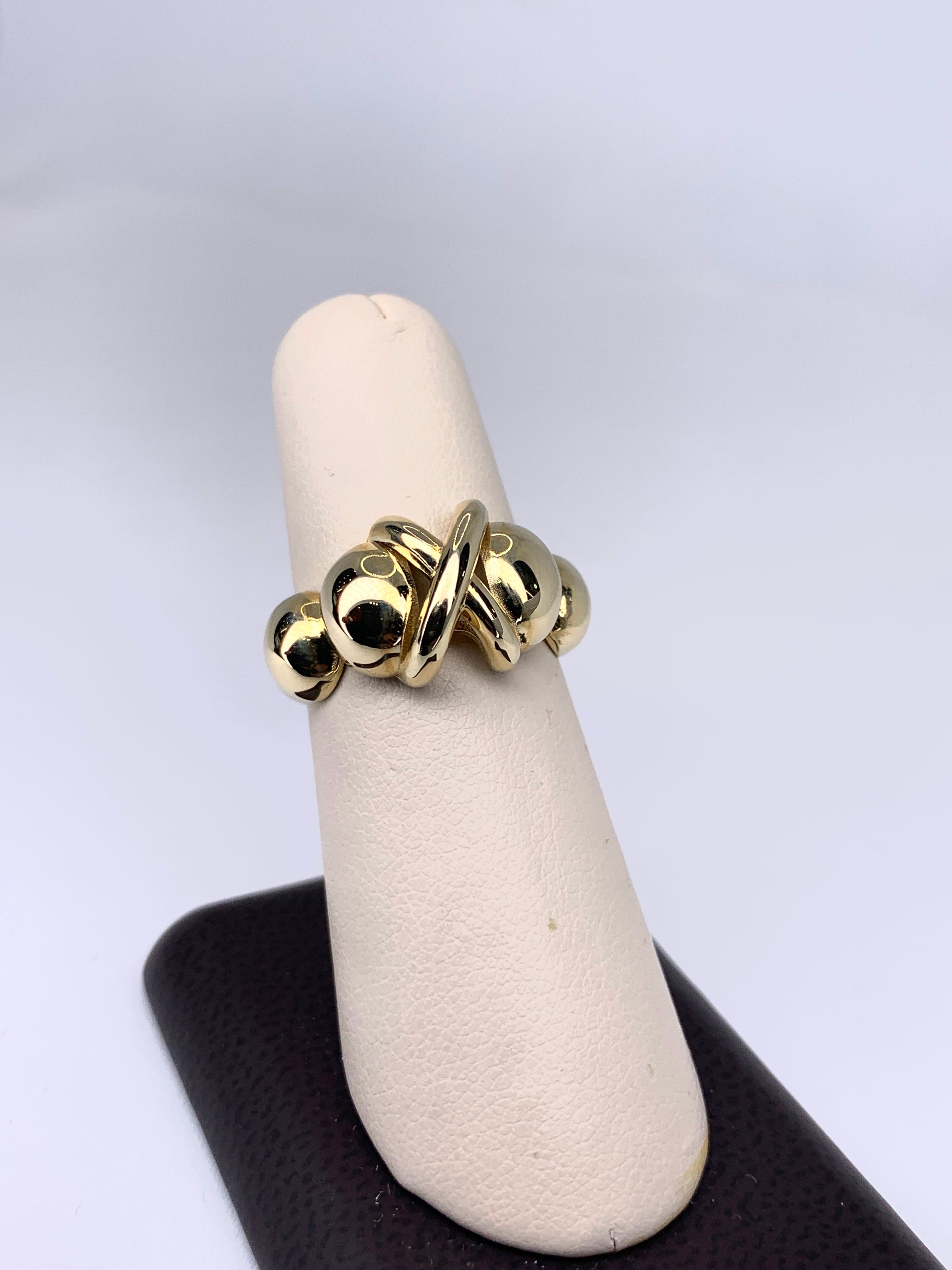 Stylish 10K gold ring with decorative design, size 7 1/2