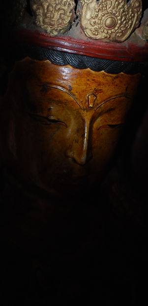 Buddha statue in darkness.JPG
