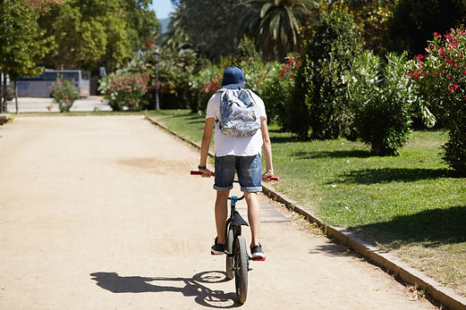 boy-riding-his-bicycle-park.jpg