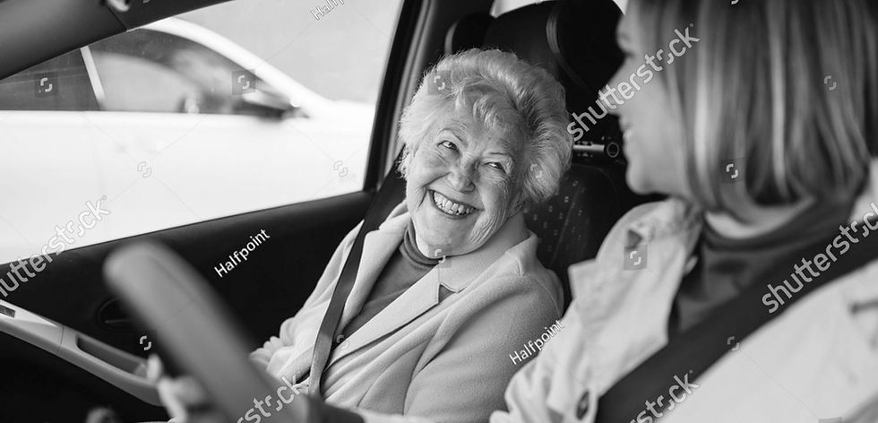 stock-photo-granddaughter-driving-her-elderly-grandmother-in-the-car-taking-her-to-the-doc