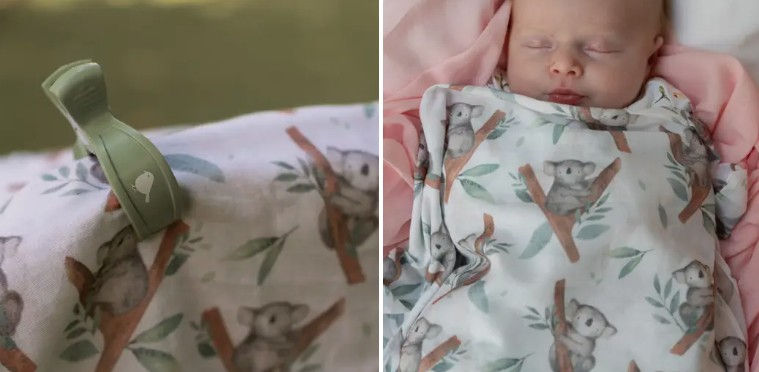 Thumbnail: an image of a pram containing a lion swaddle & pram clips