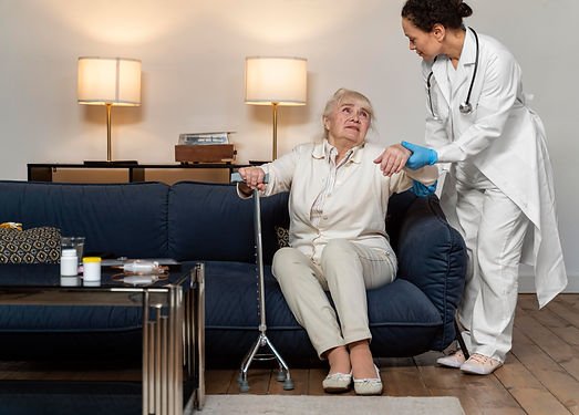 doctor-helping-her-old-patient-stand-up.jpg