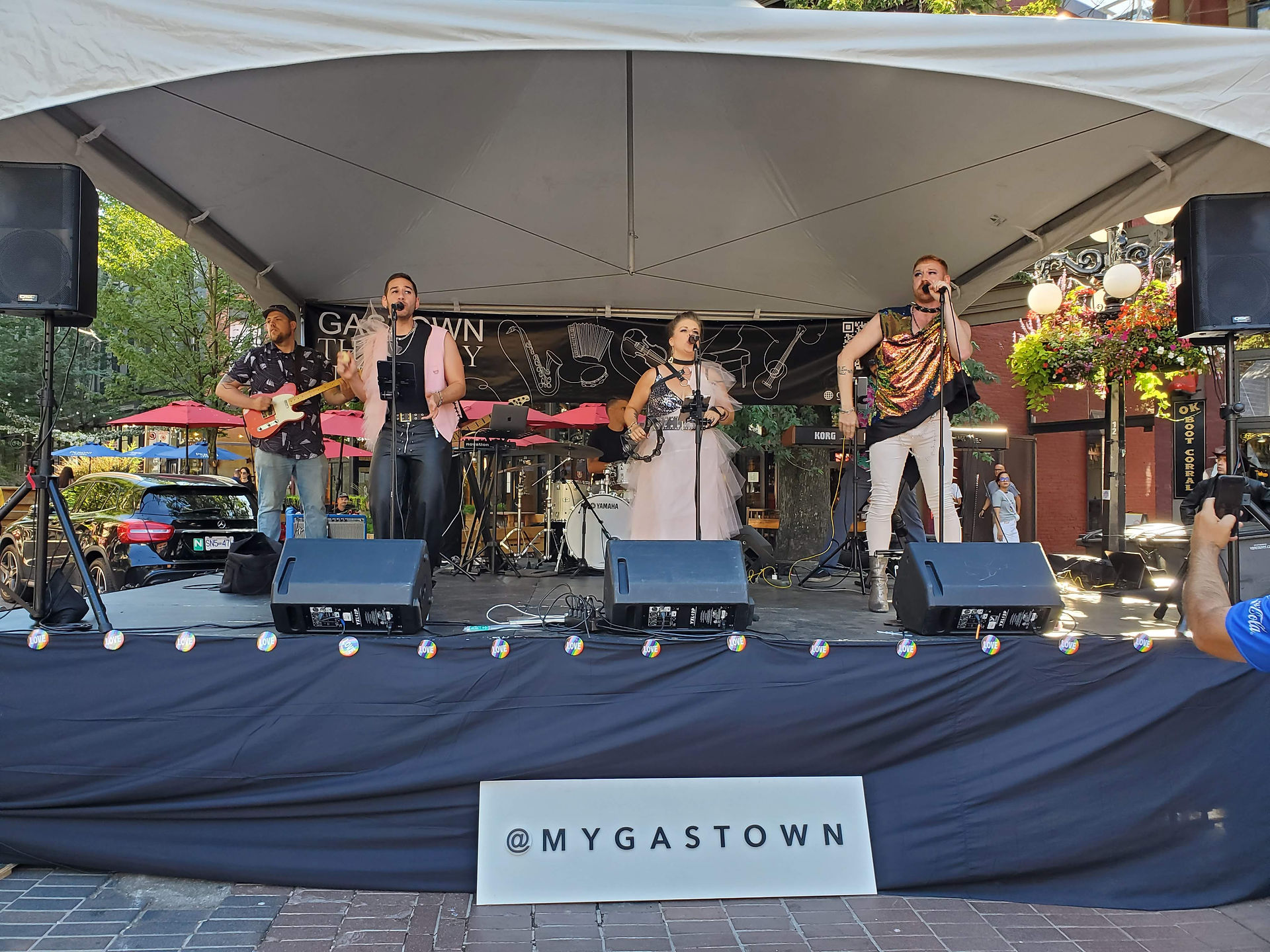 Performing on stage at Gastown Pride Kickoff 2023