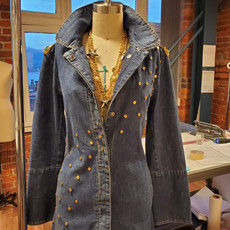 Behind the Scenes - Closeup of the upcycled gold studded denim dress
