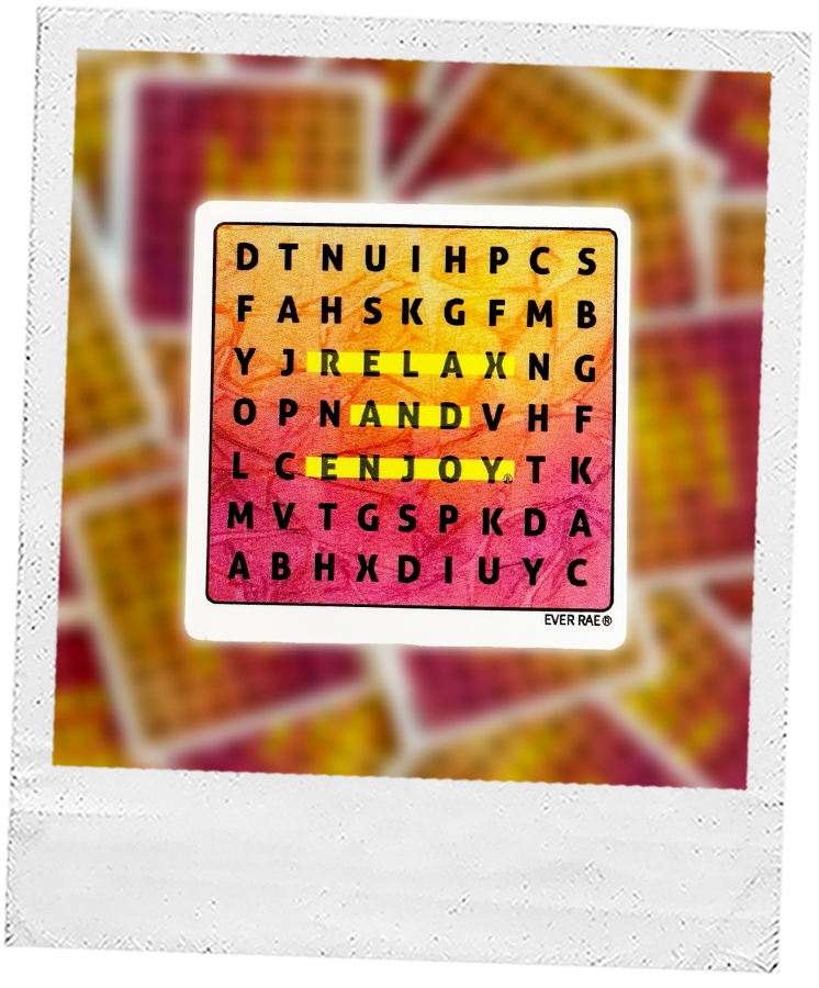 a sticker of a mini square word search. The square looks like the a sunset, and “relax and enjoy” is highlighted