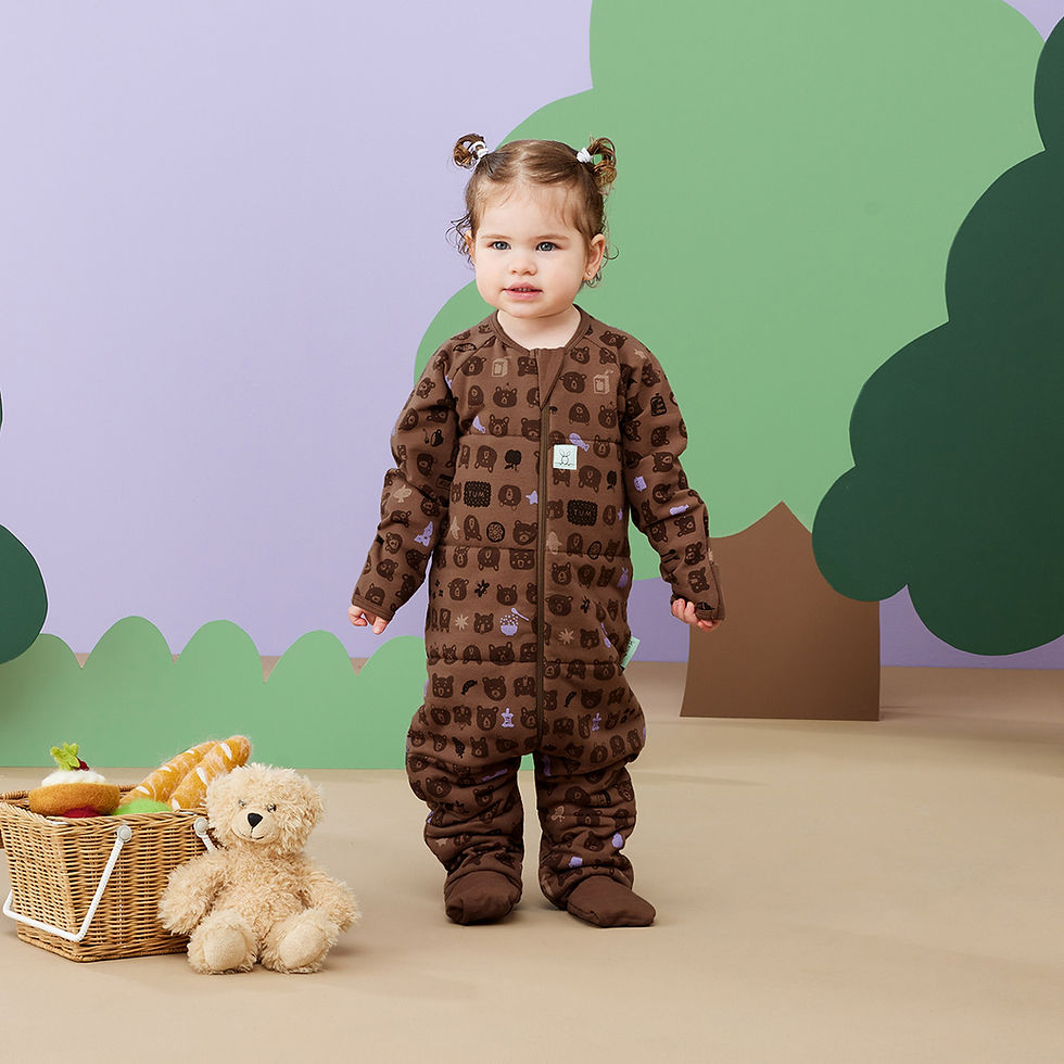 Thumbnail: ergoPouch Sleep Onesie 3.5 Tog Picnic Print toddler with ponytails
