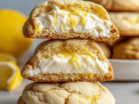 Zesty Lemon Cheesecake Stuffed Cookies That Bake Up Thick And Craggy With A Creamy Lemon Center And A Glossy Citrus Glaze Dripping Over The Top