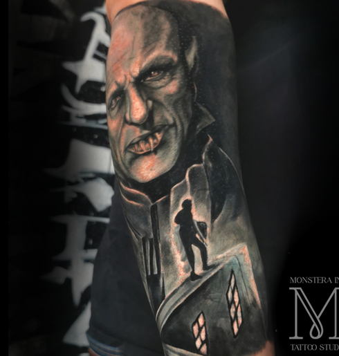 A realistic black and grey tattoo done in romford