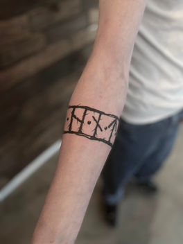 Viking rune band tattoo done at monstera ink tattoo studio in east london