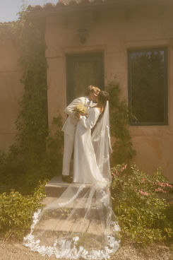 Real Bride Callie wearing a bespoke gown, starting from the Luna slip creation, she customised the design from there.