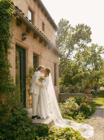 Callie wore a bespoke Amy Mair Couture gown made of full satin.