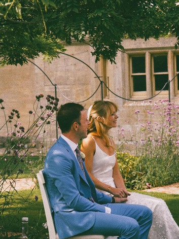 Gina in her manor wedding wearing Milan.
