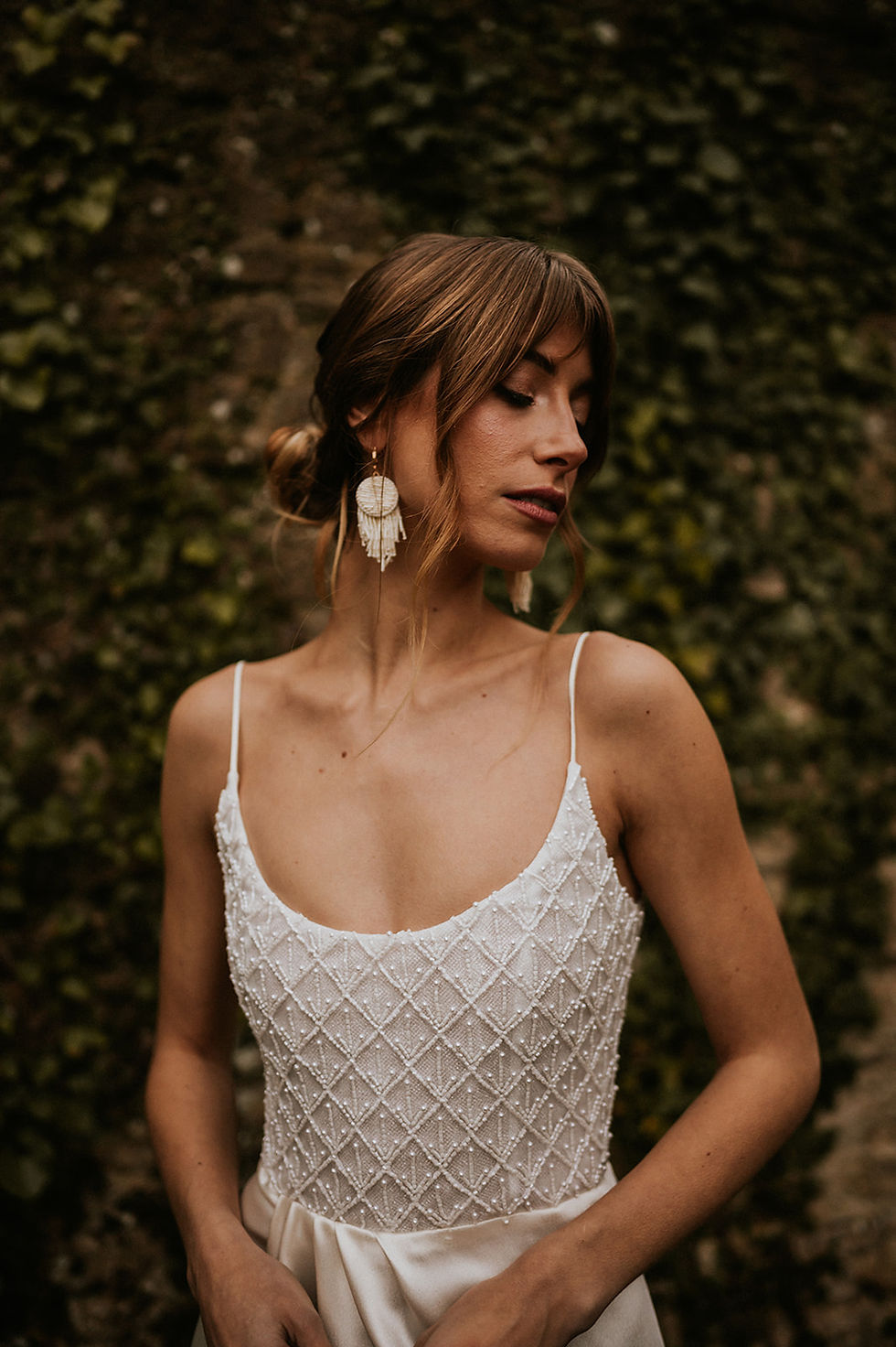 Miniatyrbild: Detailed View of Beaded Wedding Dress with Geometric Pattern