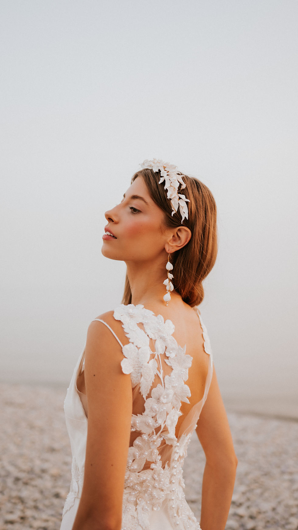Miniatúra: Detailed Back View of Lace Applique Wedding Dress with cutout Lace Across Shoulder