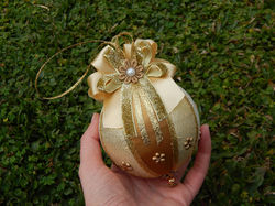 Bolas de Natal artesanal dourada