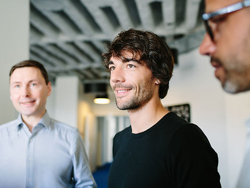 Young Businessman with Colleagues