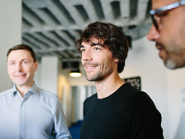 Young Businessman with Colleagues