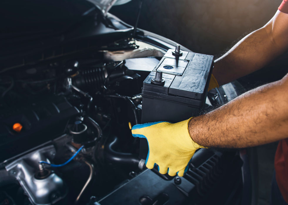 car battery being replaced by technician 