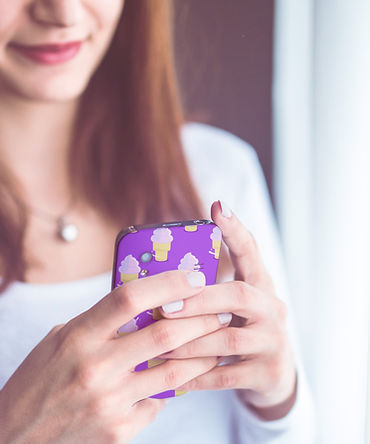 A young woman using her phone
