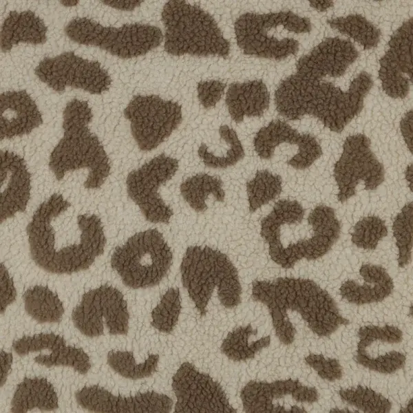 Nahansicht von weichem Stoffmuster mit beigen und braunen Pantherflecken.