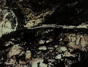 The Caves of Androzani review: The Fifth Doctor, played by Peter Davison, crawls through the caves to retrieve the antidote