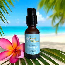 Sweet Mana's Vitamin C Cleansing Oil with a tropical background