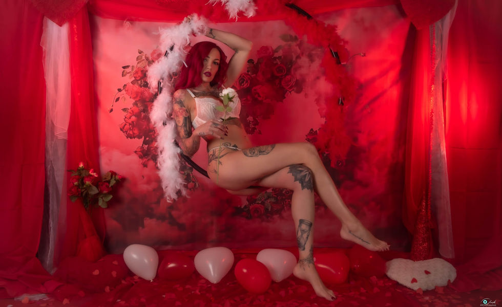 Photographie portrait en studio d'une femme en lingerie