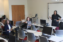 India Miles hosting an imaging workshop at the Petersburg Library, teaching local entrepreneurs branding and marketing strategies to grow their businesses.