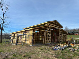 Progress of barn construction: framing  installation ongoing at the Mountain Grove location.