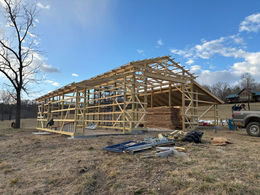 Progress of barn construction: framing  installation ongoing at the Mountain Grove location.