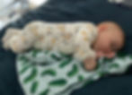 A asleep on bed sucking thumb landscape.jpg
