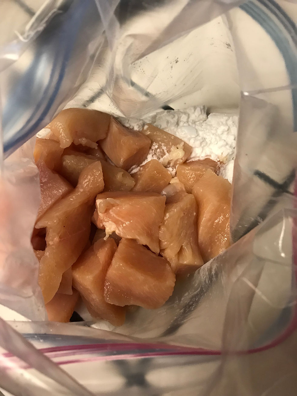 Mix nuggets and starch in a bag.