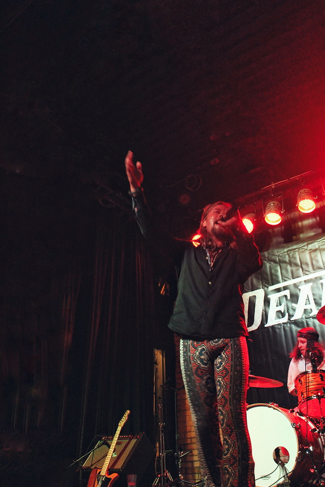 Photo of the Manitoba rock band Dead Levee performing on the Pyramid Cabaret stage.