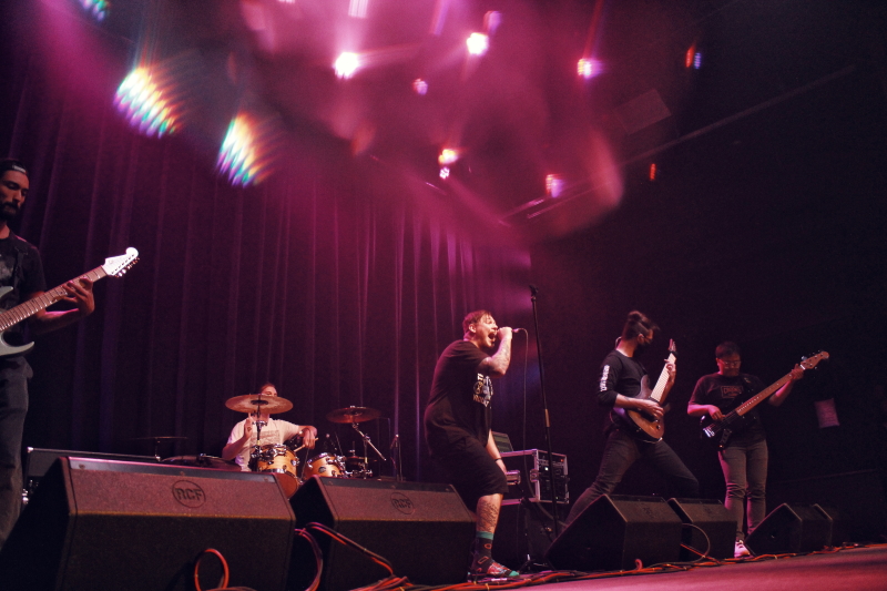 Photo of the Manitoba metalcore band Planeshifter, performing on The Park Theatre stage.