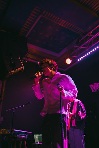 Pop-duo DWLLRS performing at the Voodoo Room in San Diego, California.