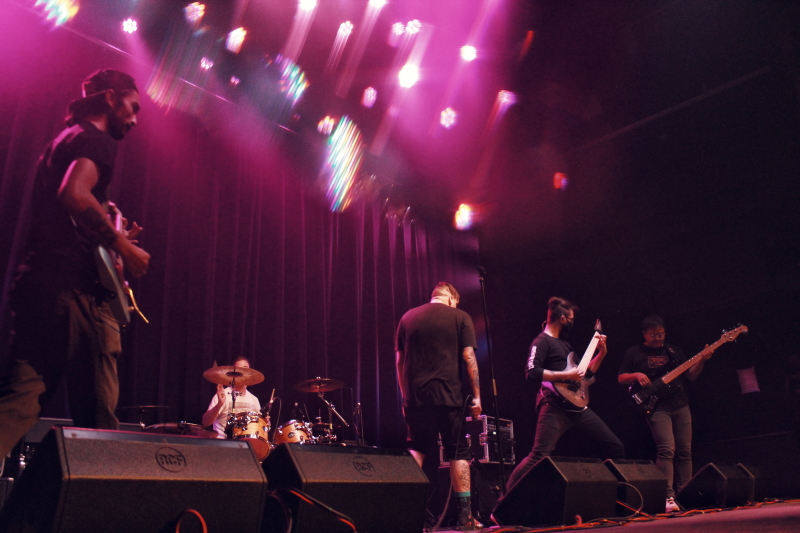 Photo of the Manitoba metalcore band Planeshifter, performing on The Park Theatre stage.