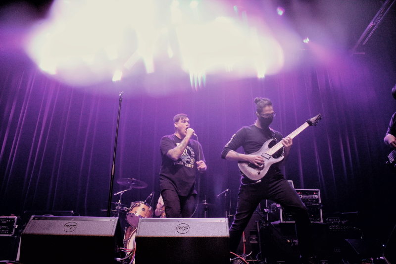 Photo of the Manitoba metalcore band Planeshifter, performing on The Park Theatre stage.