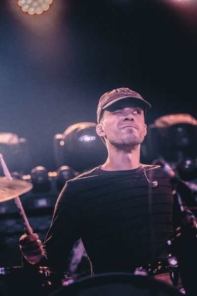 Metal band Divide the Fall tearing down the TAK Music Venue stage.