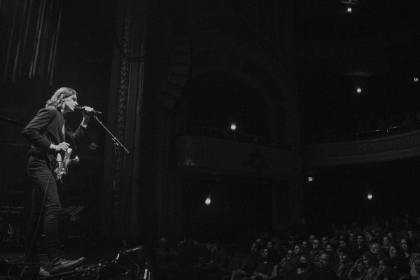 Patrick Droney performing at the infamous Winnipeg venue the Burton Cummings Theatre.