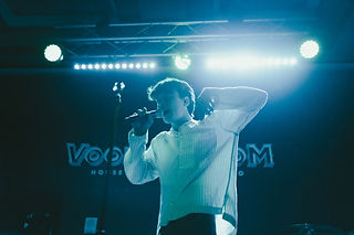 Pop-duo DWLLRS performing at the Voodoo Room in San Diego, California.