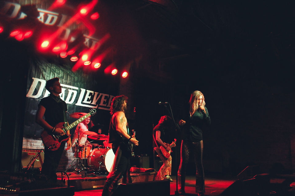 Photo of the Manitoba rock band Dead Levee performing on the Pyramid Cabaret stage.