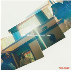 Overlapping images of a man in a dim room with sunlight. Text reads "the loneliest place I've ever been." Mood appears introspective.