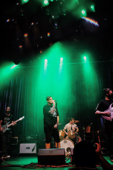 Photo of the Manitoba metalcore band Planeshifter, performing on The Park Theatre stage.